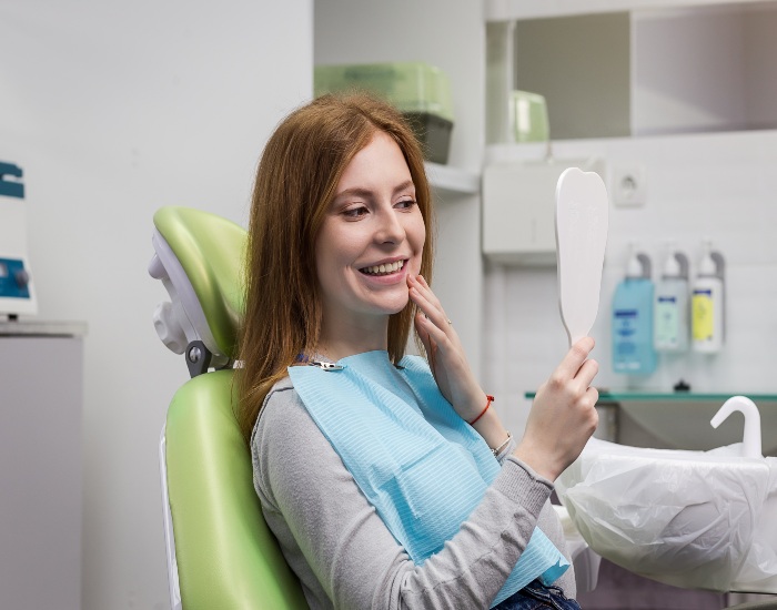 Reiser Dental offered sensitive teeth treatment to a woman to strengthen her teeth in Denver, CO